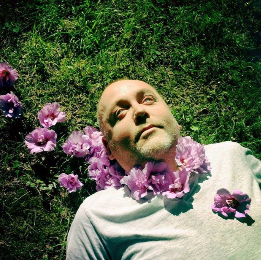Simon O'Corra — portrait among flowers